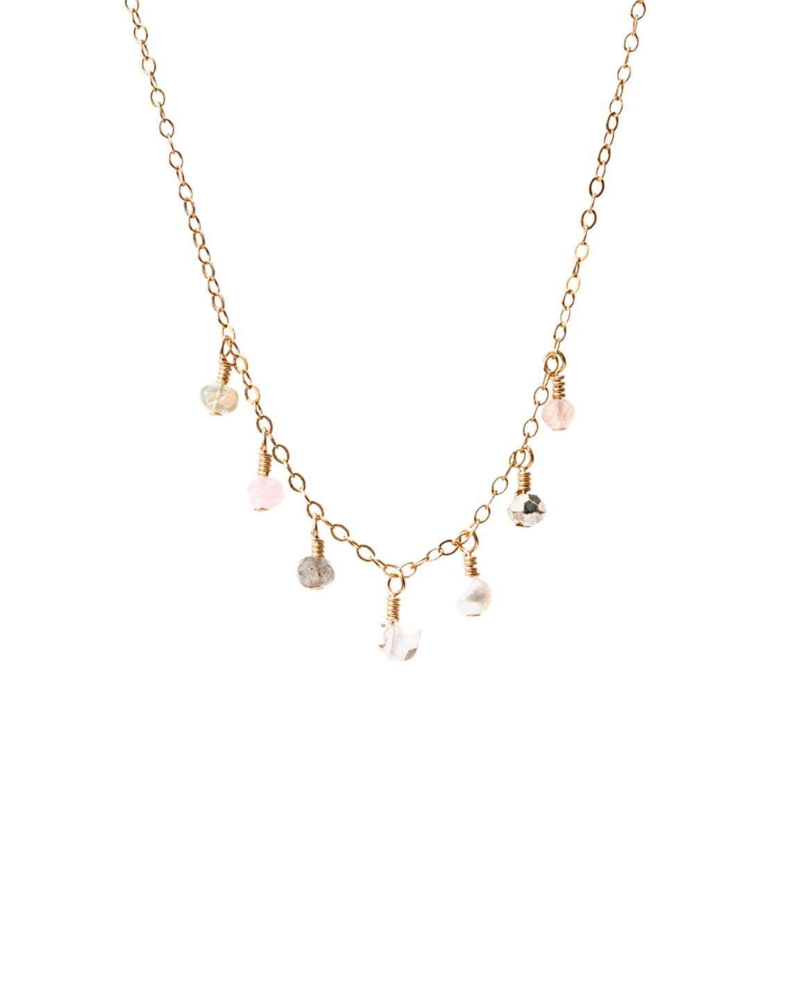 Delicate necklace with small pink gemstones, herimer diamond and pearl on a white background