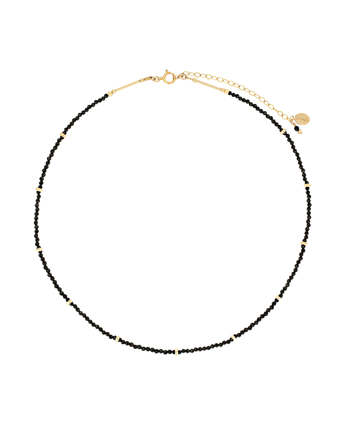 Black gemstone gold beaded necklace on a white background