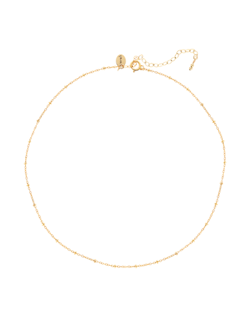 Gold chain necklace on a white background