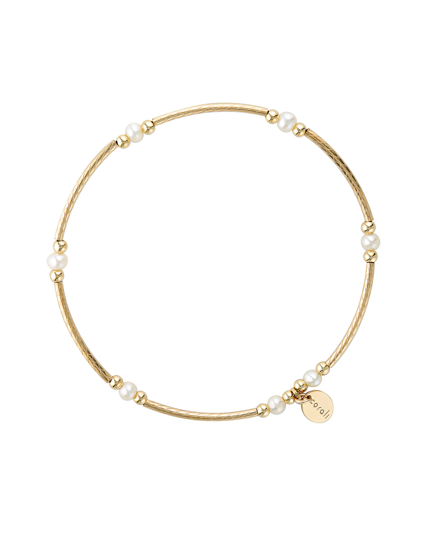 Gold bracelet with pearls on a white background