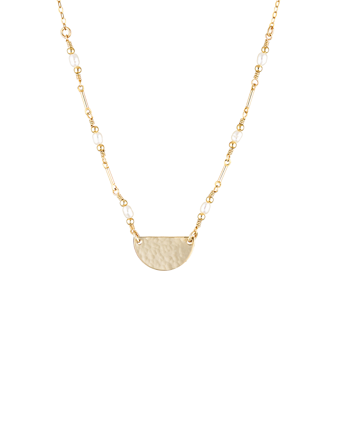 Gold necklace with a half-circle pendant and pearls on a white background