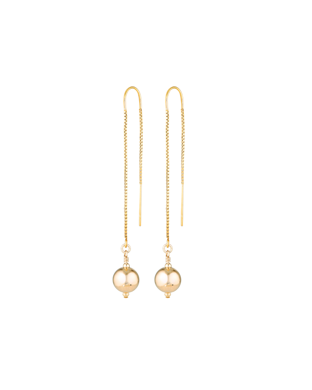 Gold thread earrings with round gold beads on a white background