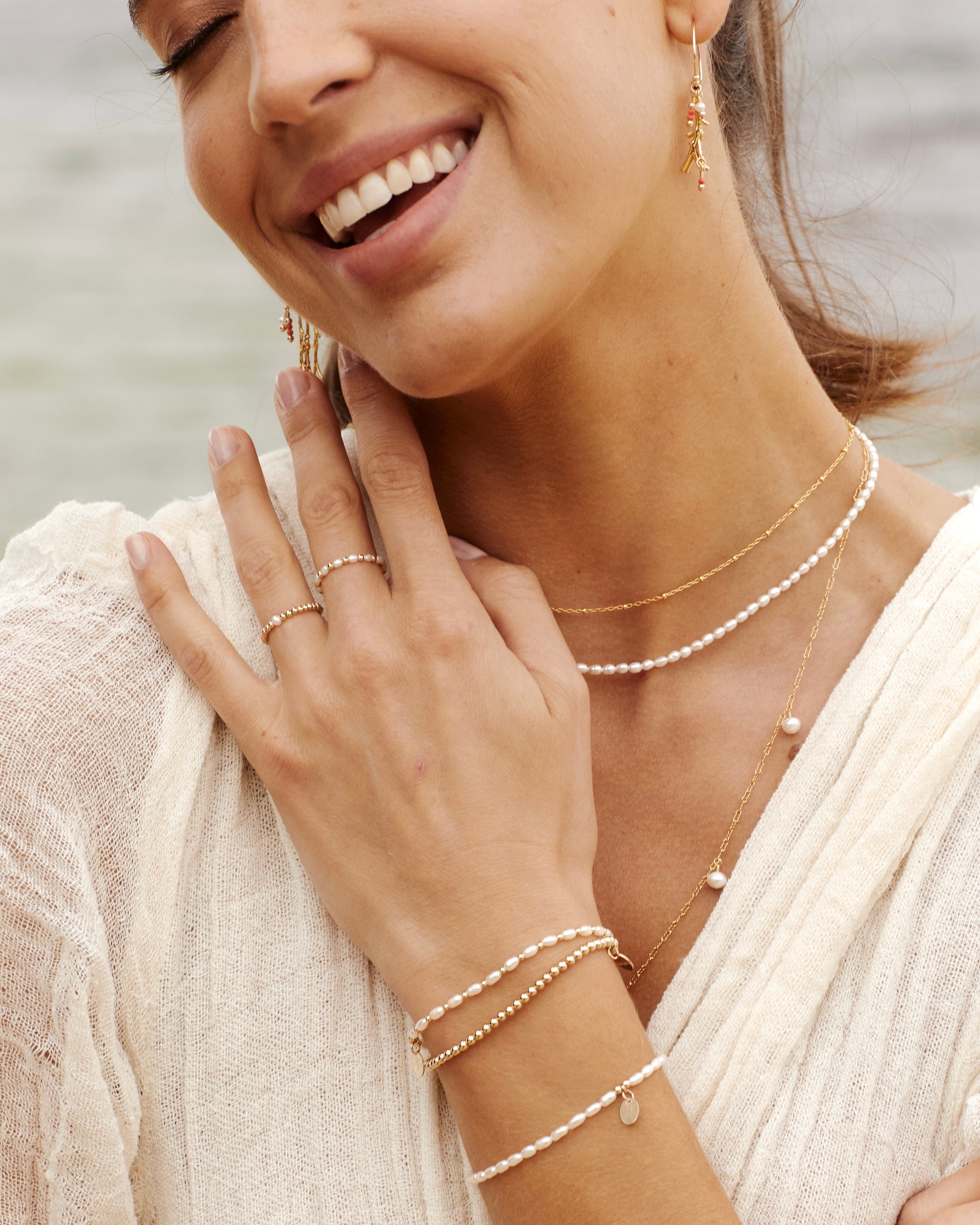 gold and pearl beaded ring