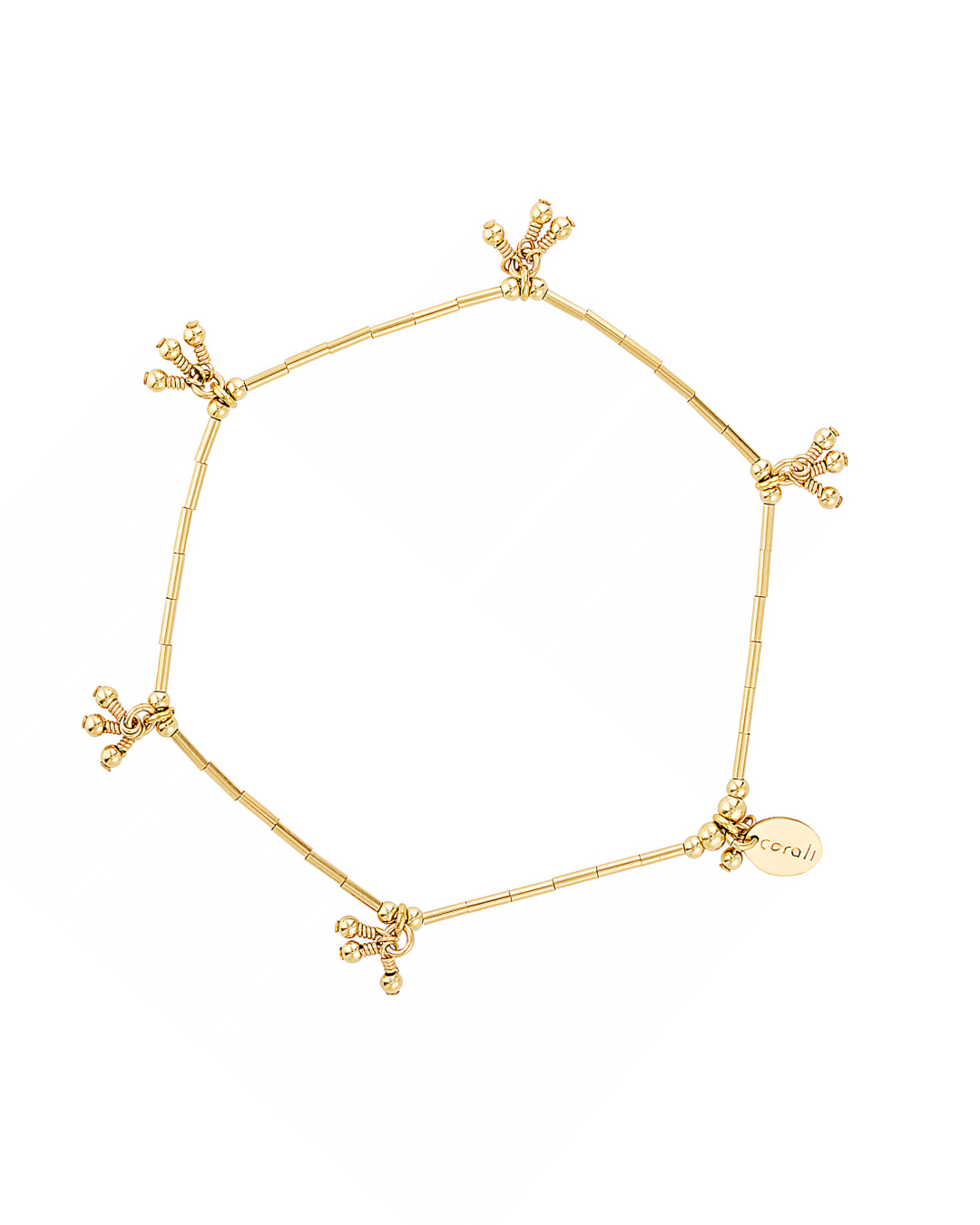 Gold bracelet with small decorative elements on a white background
