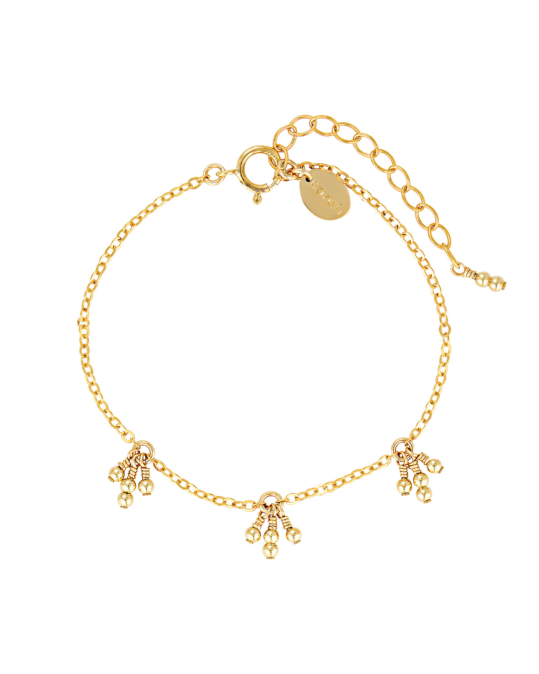Gold bracelet with gold drop beads on a white background