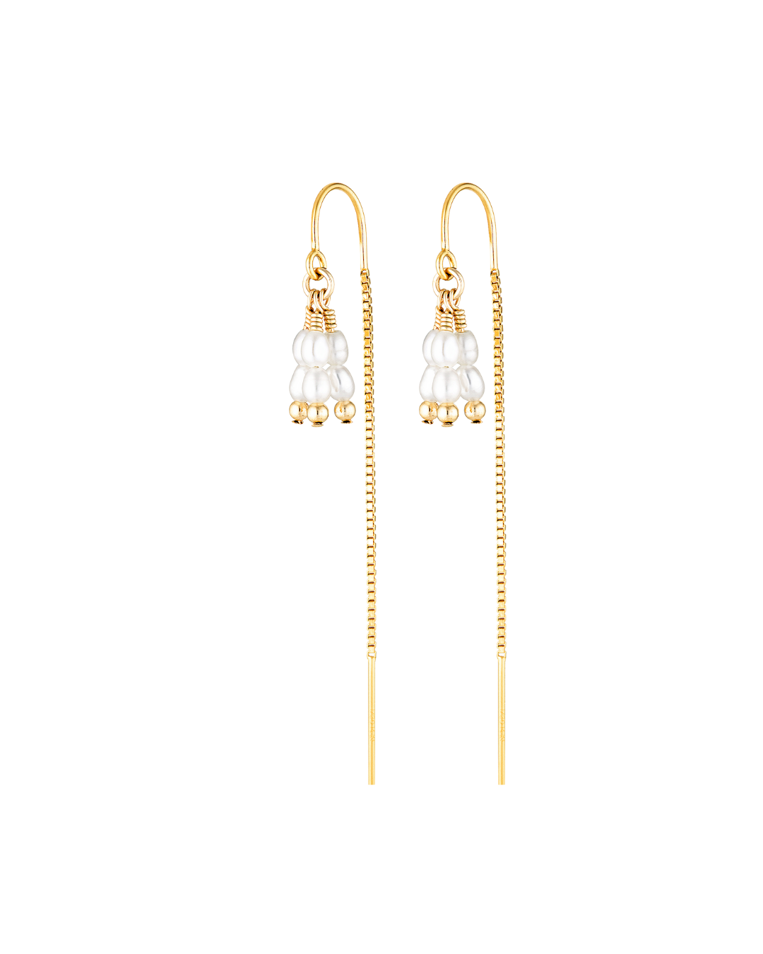 Gold earrings with pearl-like beads on a white background