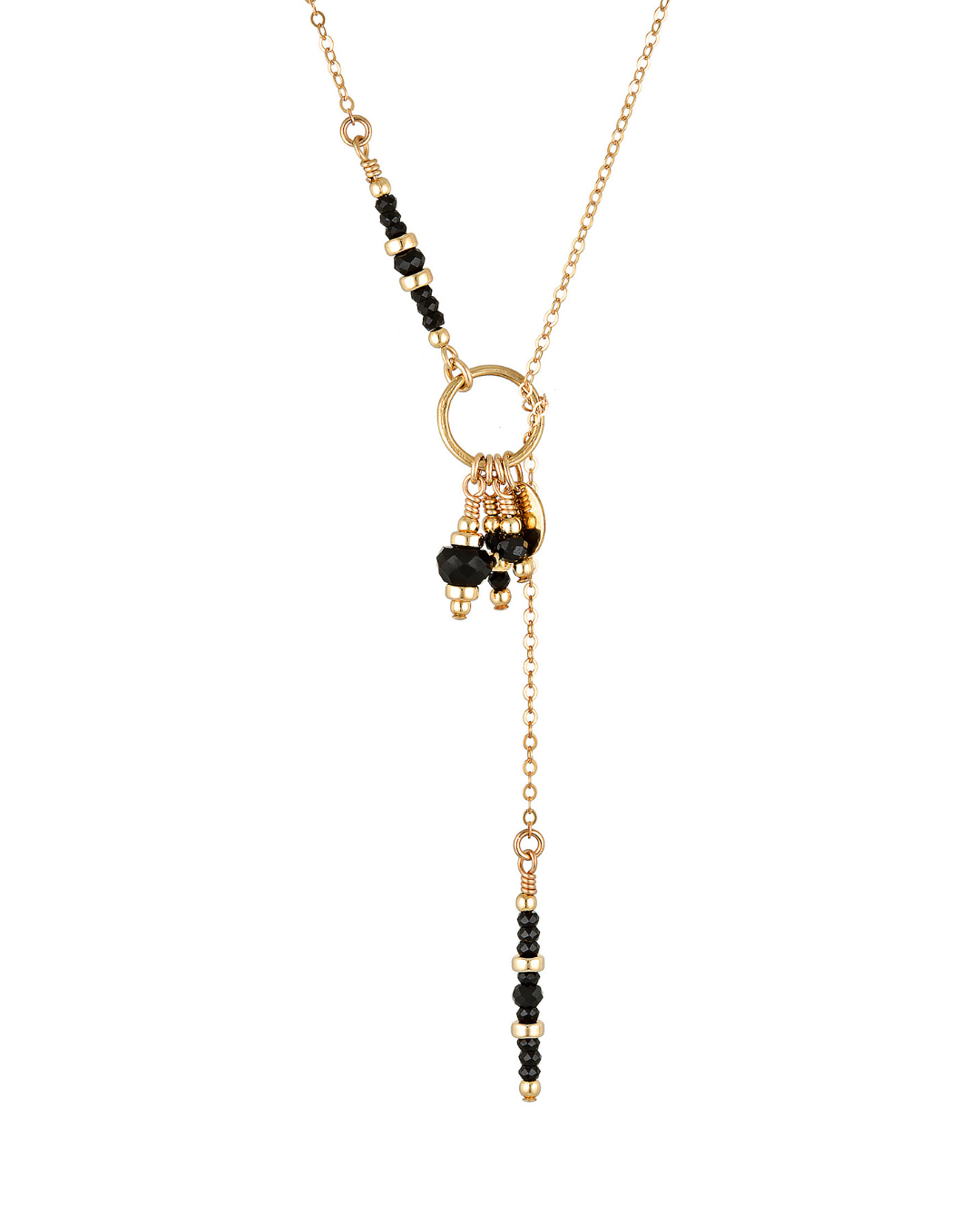 Gold necklace with black onyx spinel on a white background