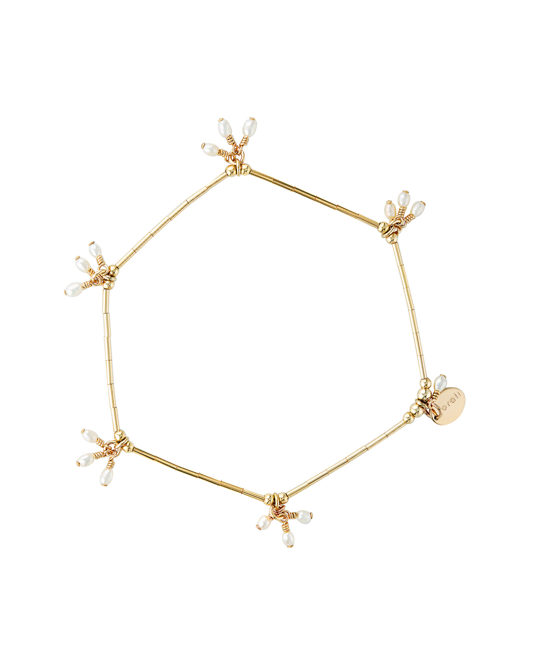 Gold bracelet with pearl beads on a white background