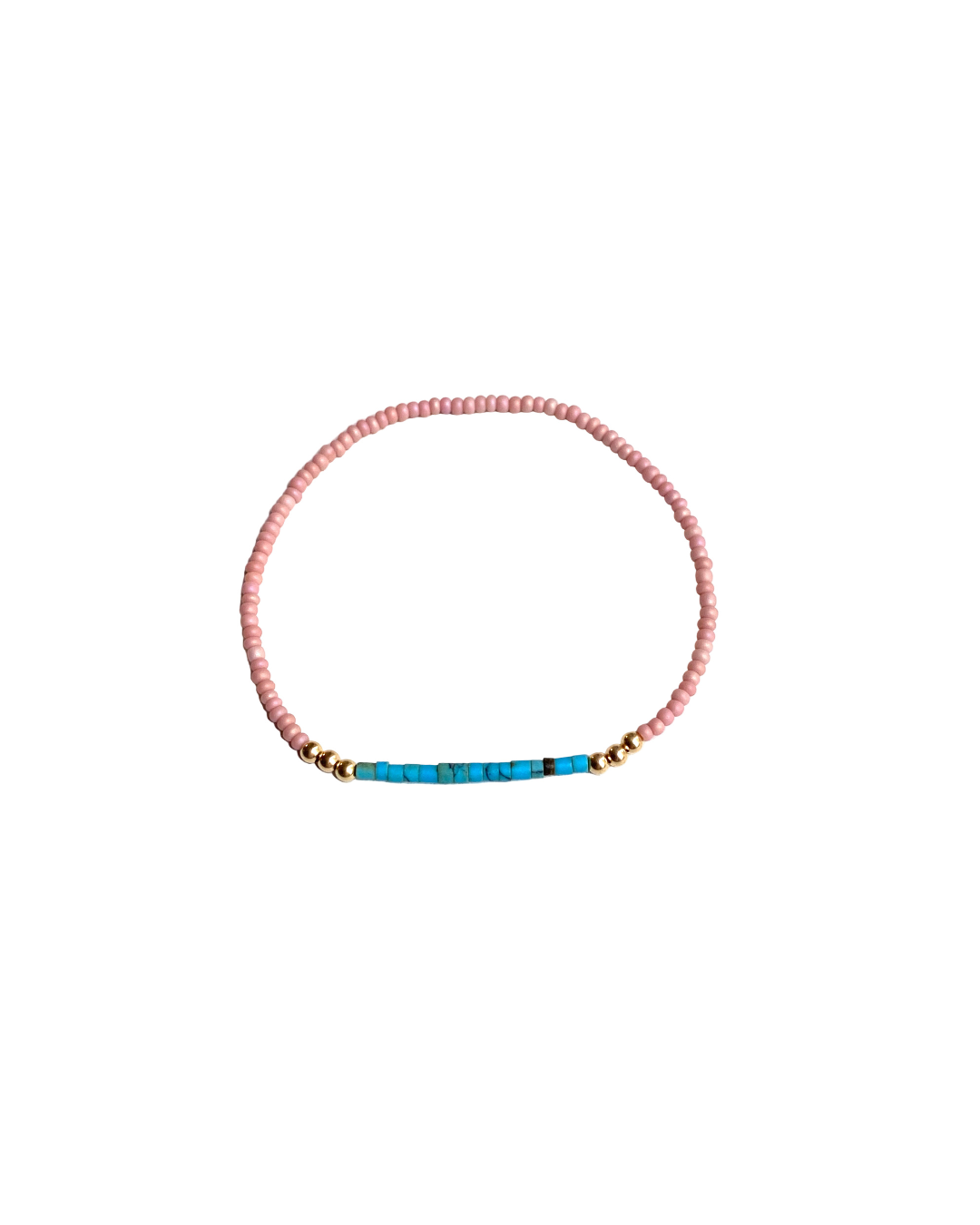 Bracelet with pink, blue, and gold beads on a white background