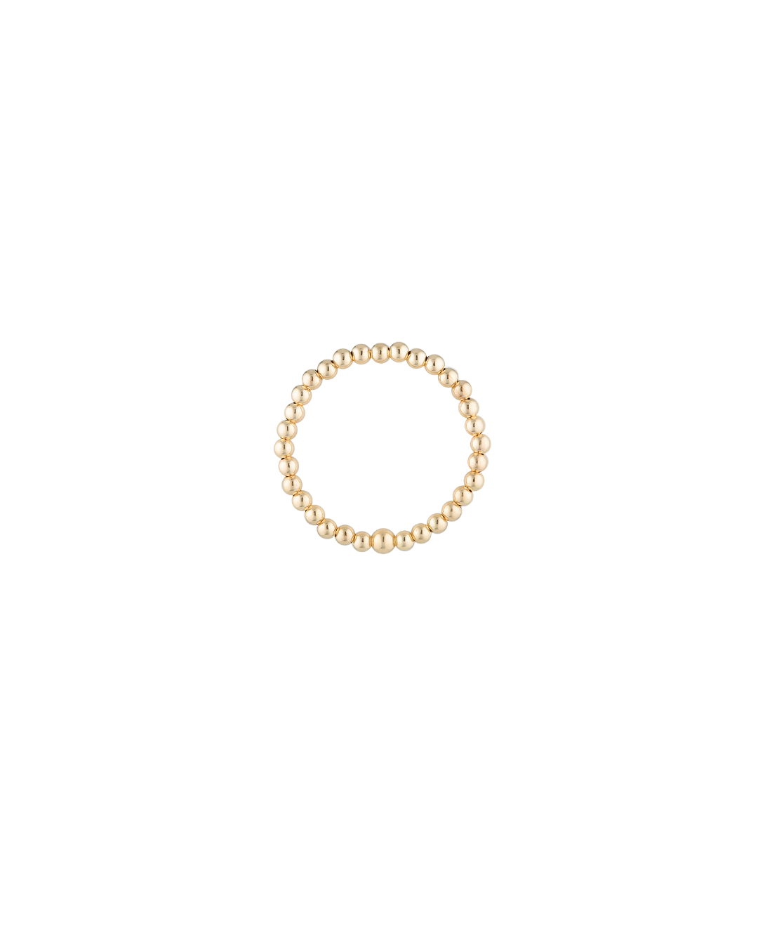 Gold beaded ring on a white background