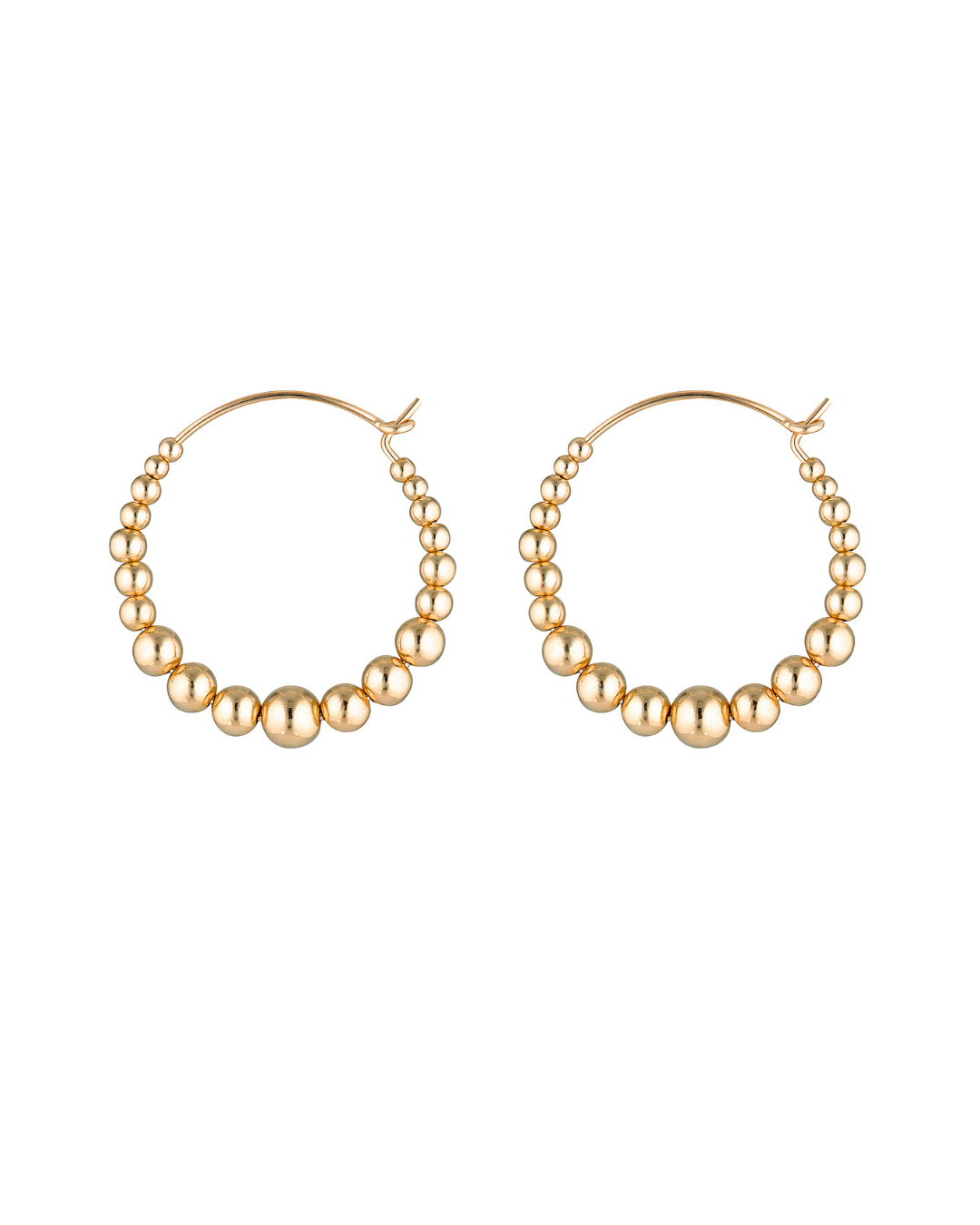 Gold hoop earrings with bead detailing on a white background