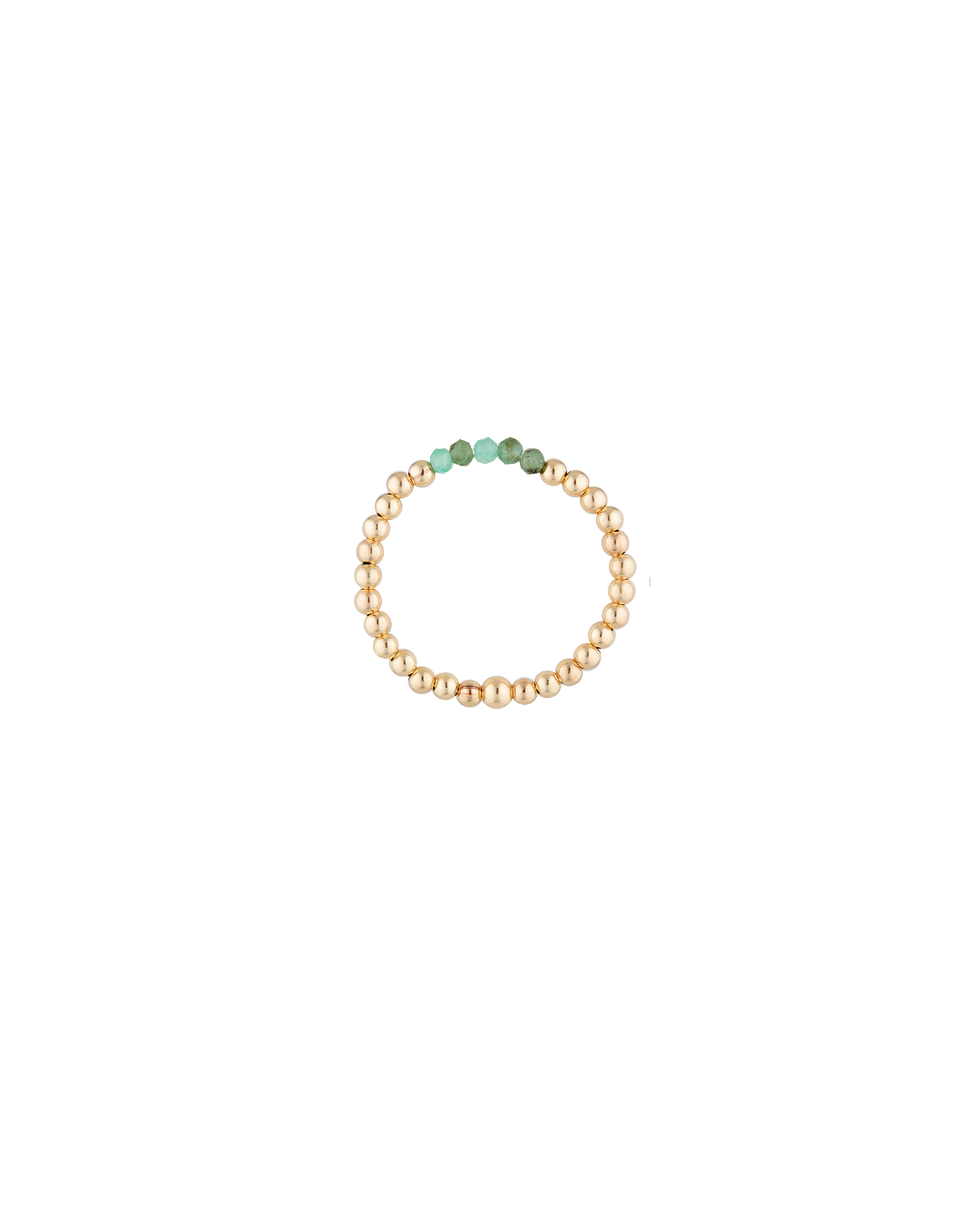 Gold beaded ring with emerald gemstones on a white background