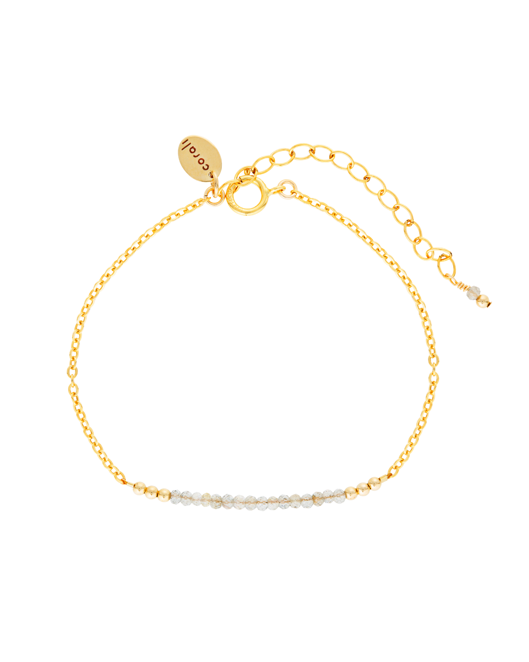 Gold bracelet with a subtle design on a white background