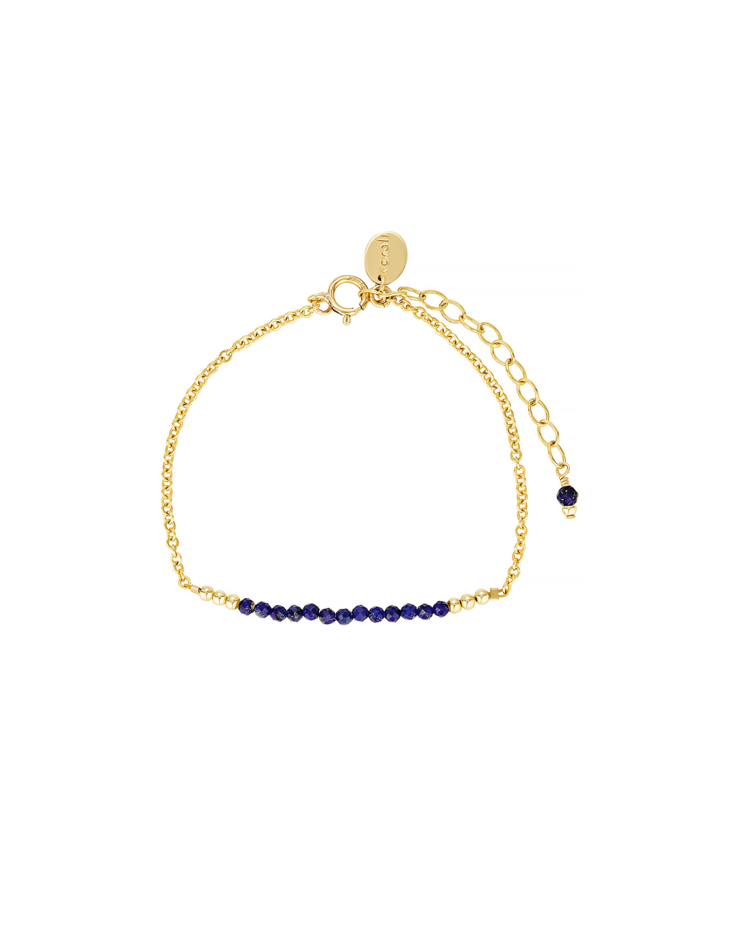 Gold bracelet with lapis lazuli gemstones on a white background