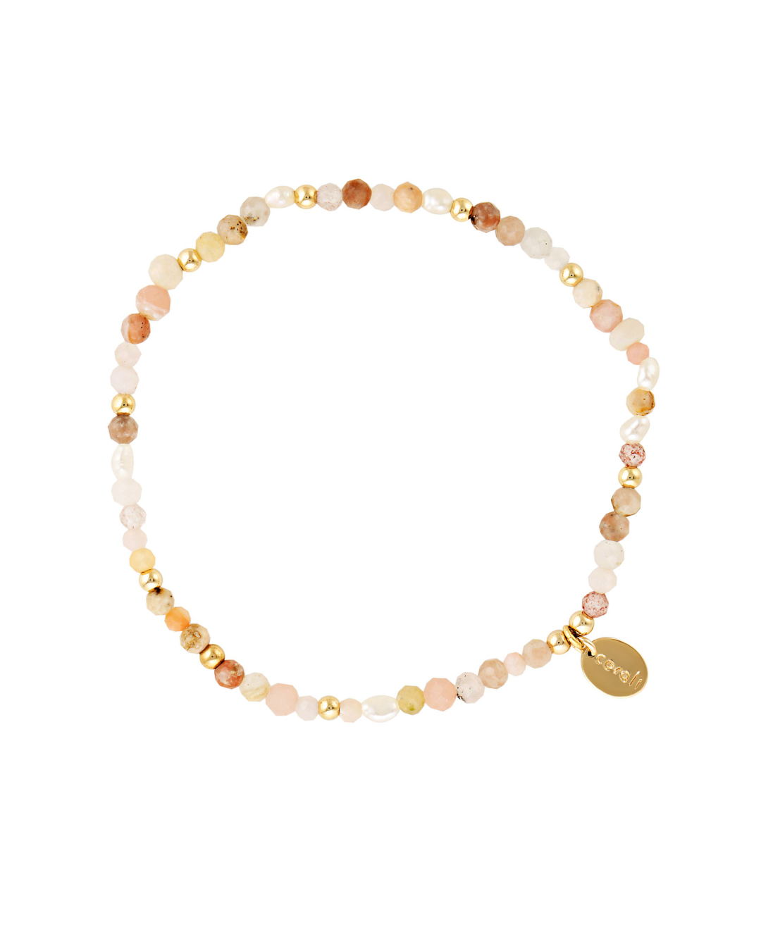 Pearls and pink gemstones beaded bracelet with a gold tag on a white background