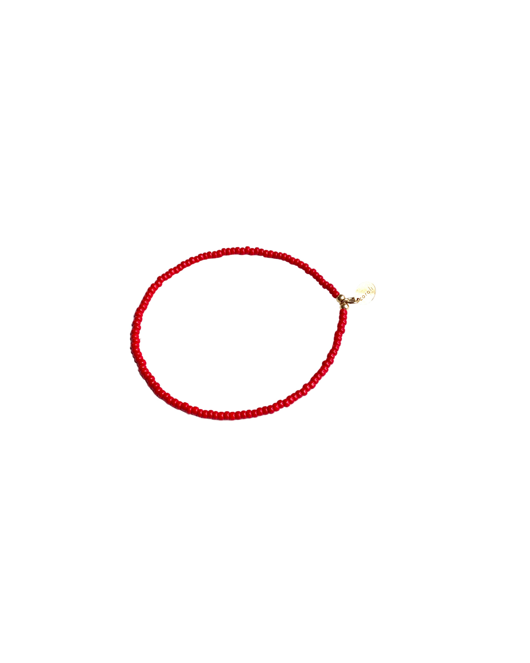Red beaded bracelet on a white background