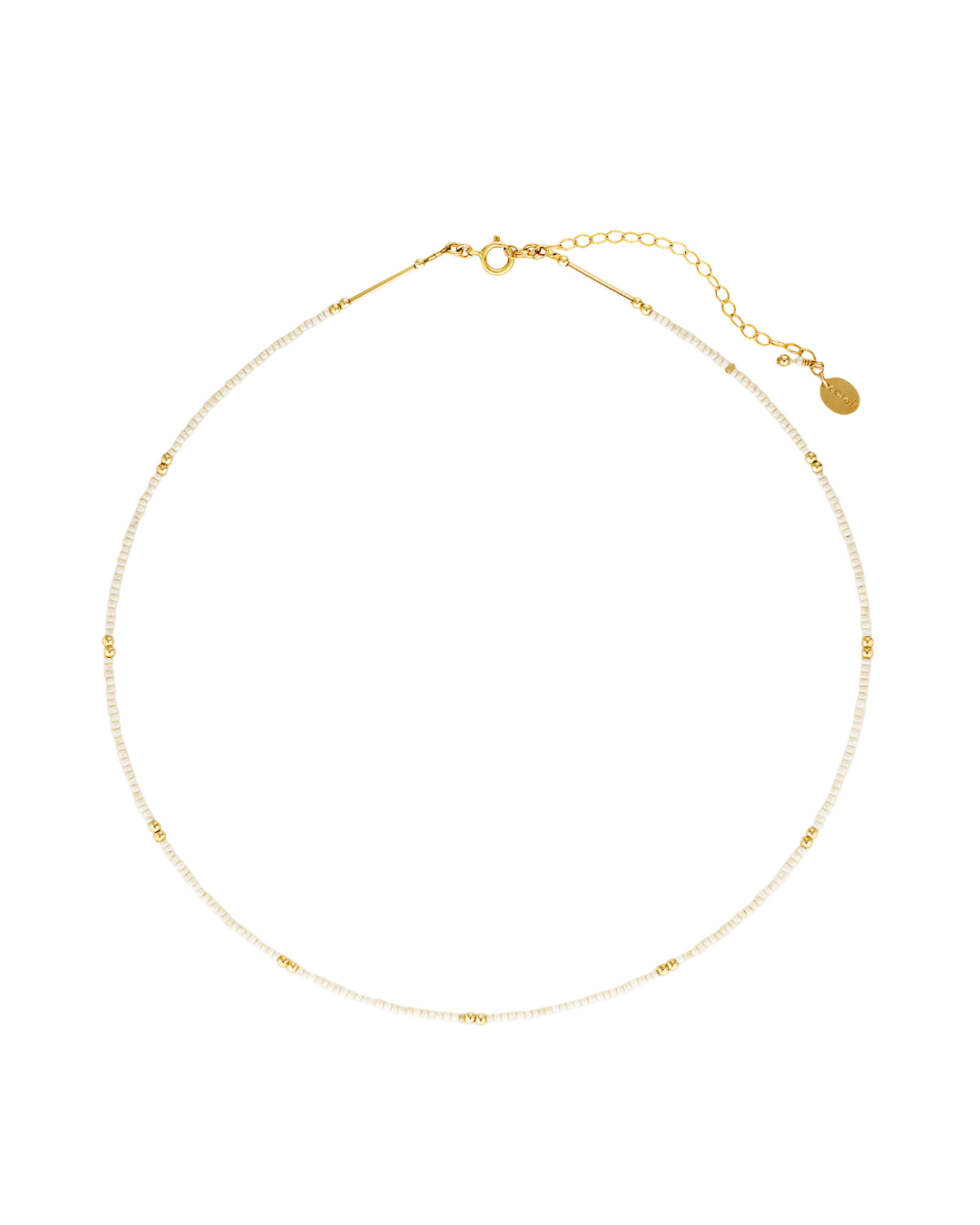 Cream glass bead and gold bead necklace on a white background