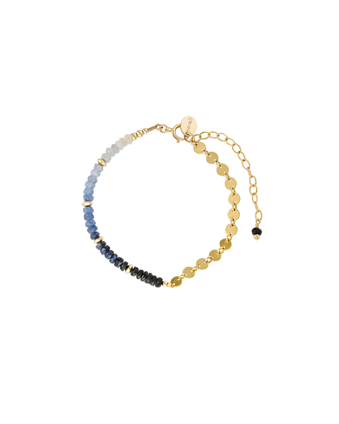 Gold bracelet with sapphire gemstones on a white background