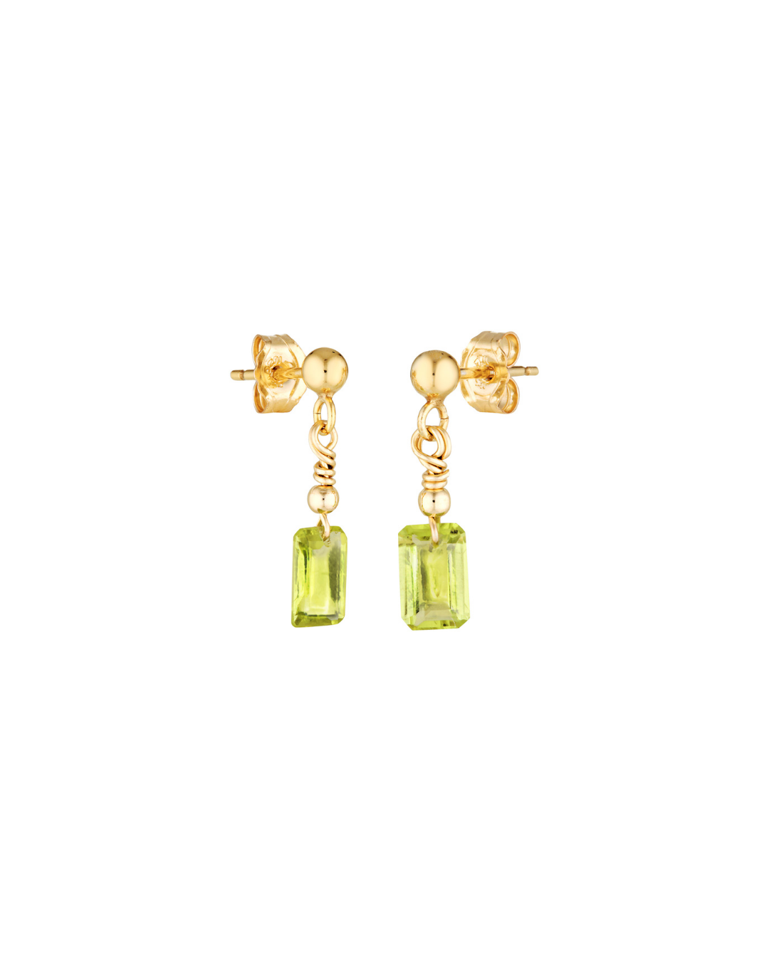 Gold earrings with green gemstones on a white background