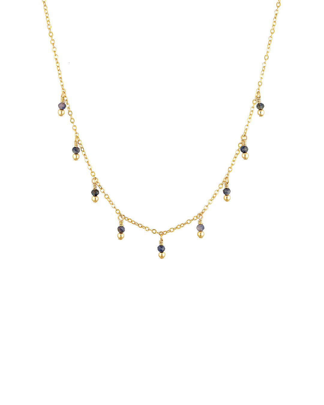 Gold necklace with small black beads on a white background