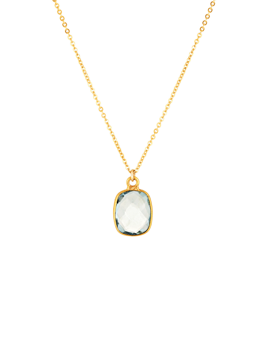 Gold necklace with a clear aquamarine stone pendant on a white background