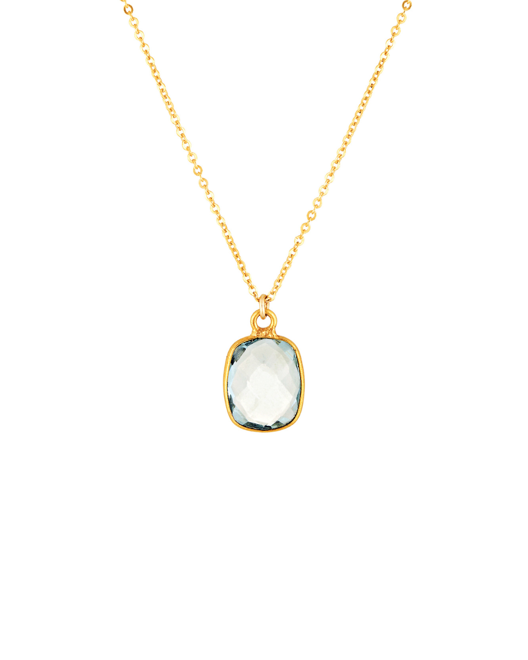Gold necklace with a clear aquamarine stone pendant on a white background
