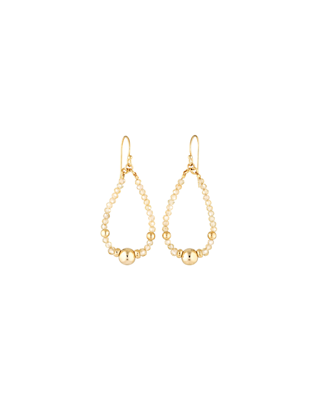 Pair of gold zircon gemstone earrings on a white background