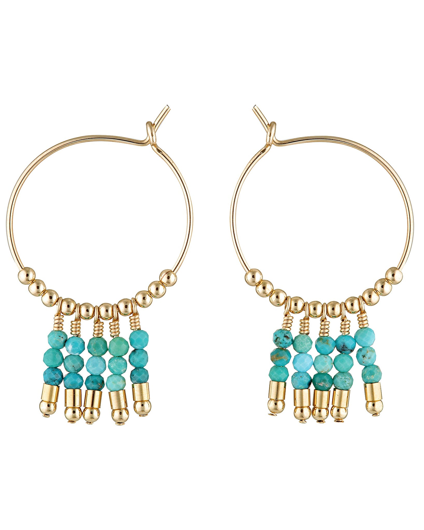 Gold hoop earrings with turquoise gemstones dangling on white background.